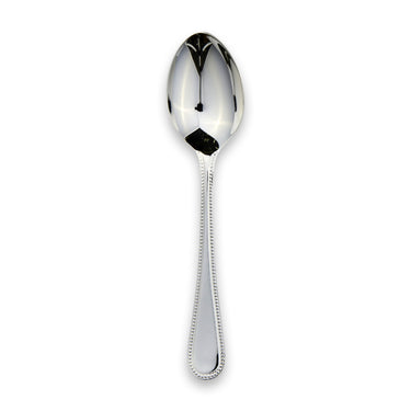 Silver spoon on a white background