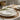 Editorial hero image illustrating Dinner Plates vs Side Plates: Which Pieces Belong in a Complete Place Setting? for a Cutlery e-commerce brand.