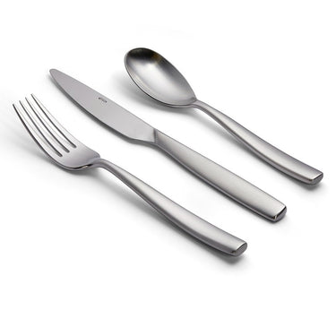 Set of Stainless steel cutlery including a fork, knife, and spoon on a white background
