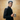 Man in suit holding silver tankard