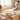 Lincoln House Cutlery Fiddle silver children's 3-piece cutlery set with knife, fork, and spoon on a toddler's table.