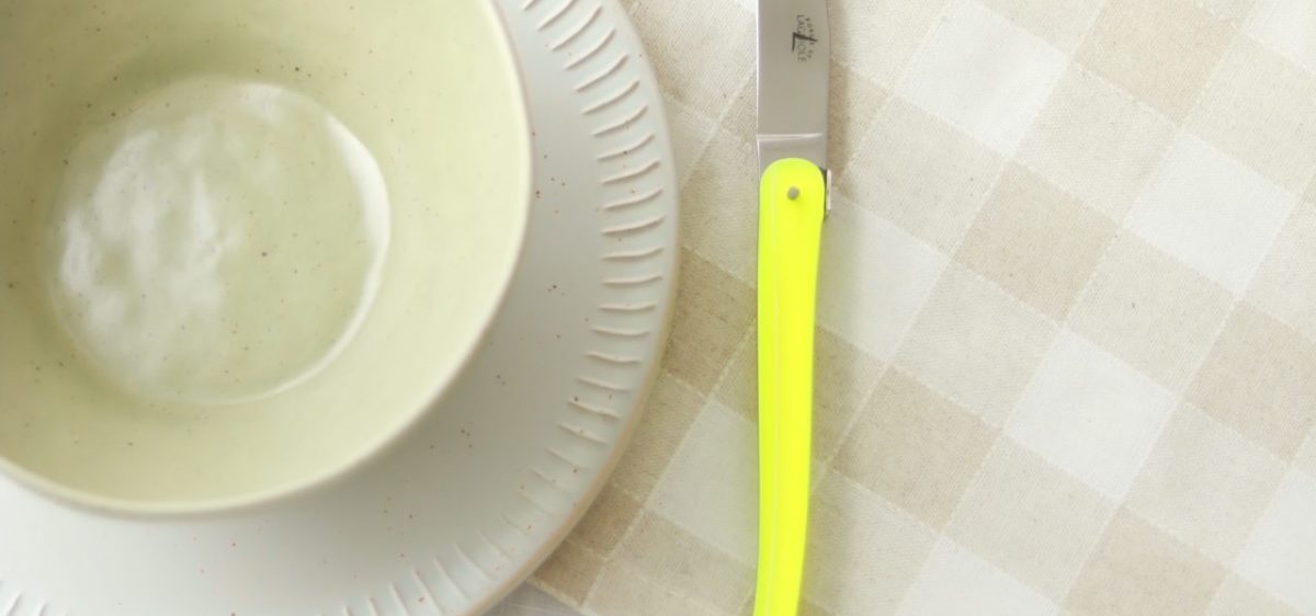 Jean Michel Wilmotte Steak Knives with yellow handle, place setting by Forge de Laguiole