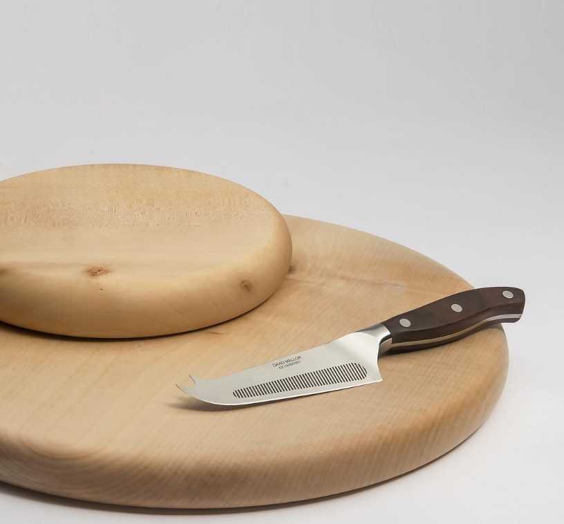 David Mellor Rosewood Cheese knife on choppng board
